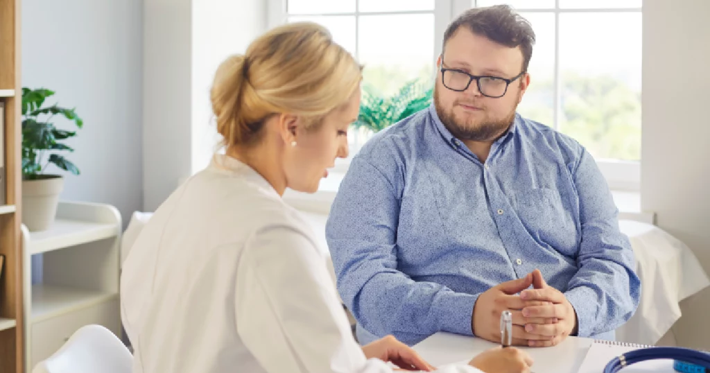Doctor Consulting Patient About Weight Management Plan by Forever Weight Loss Clinic in Chesterfield, MO