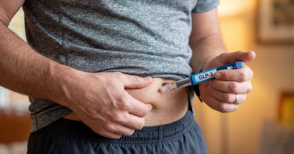 Man Injecting GLP-1 Weight Loss Medication in Chesterfield, MO | Forever Weight Loss Clinic