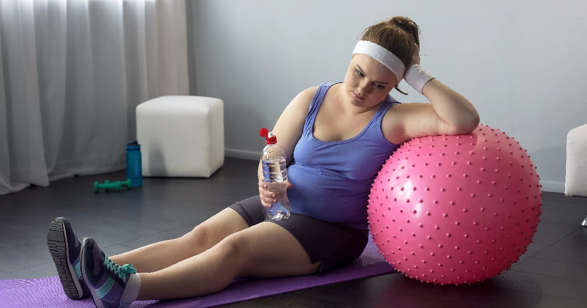 Woman Resting After Exercise Representing Weight Loss Challenges After Age 40 by Forever Weight Loss Clinic in Chesterfield, MO